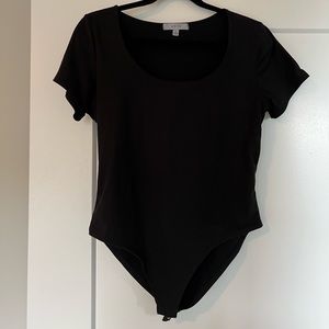 Black short sleeve shirt body suit